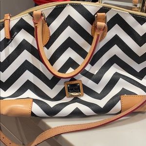 Dooney and Burke Satchel bag with strap.